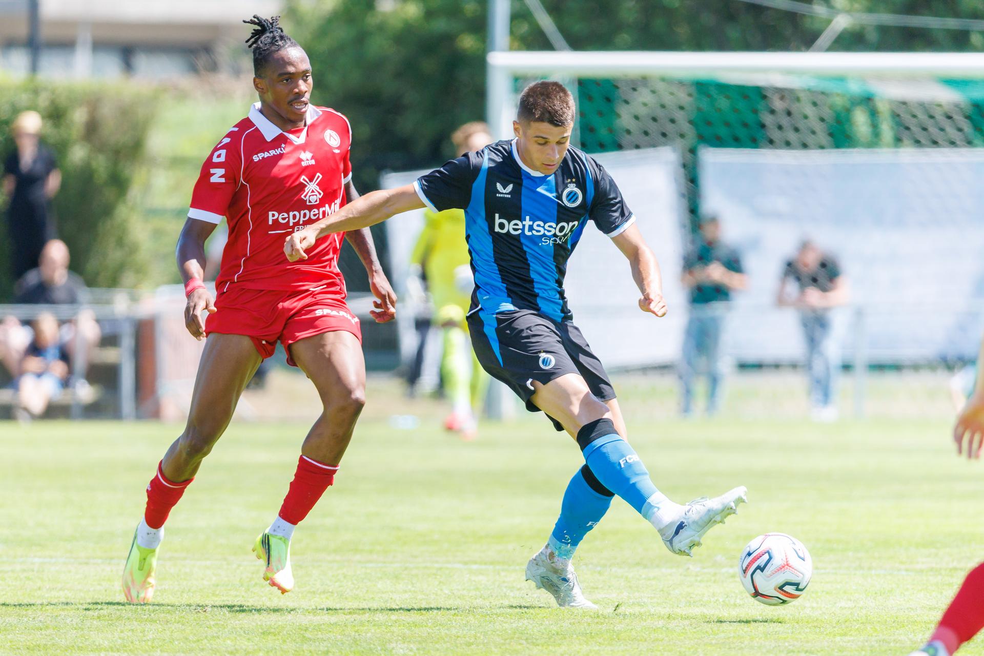 Kortrijk's James Ndjeungoue and Club's Nicolo Tresoldi fight for the ball during a friendly soccer game between KV Kortrijk vs Club Brugge, on Saturday 04 July 2026 in Knokke-Heist, in preparation of the upcoming 2026-2027 Belgian first division soccer season. BELGA PHOTO KURT DESPLENTER