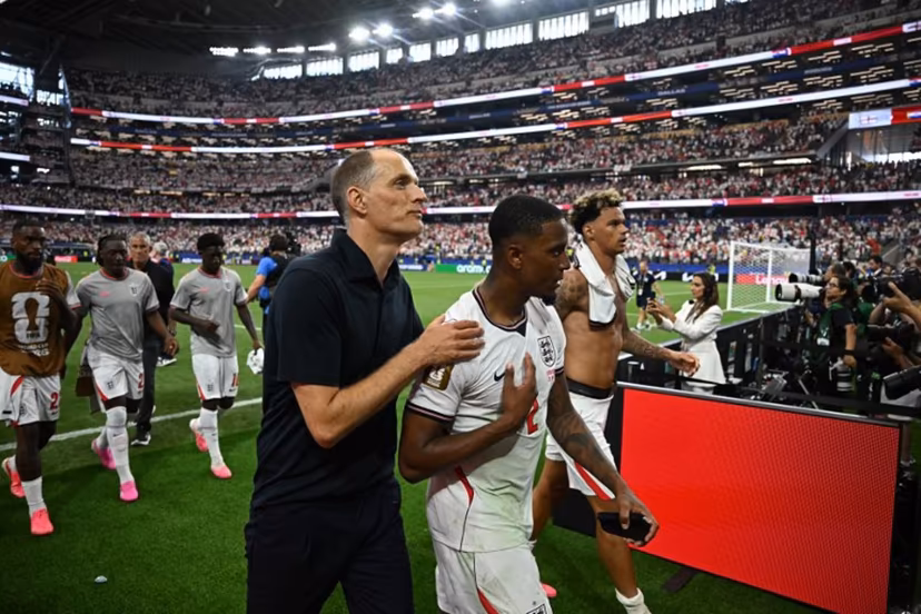 England's German head coach Thomas Tuchel (L) reacts with England's defender #02 Ezri Konsa after winning the 2026 World Cup Group L football match between England and Croatia at the Dallas Stadium in Arlington on June 17, 2026. Paul ELLIS / AFP