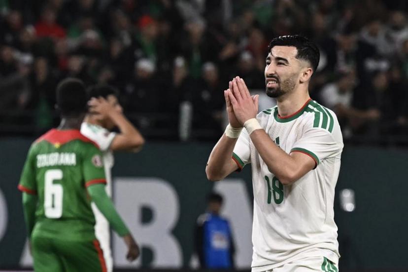 Algeria's forward #18 Mohamed Amoura (R) gestures during the Africa Cup of Nations (CAN) Group E football match between Algeria and Burkino Faso at Moulay Hassan Stadium in Rabat on December 28, 2025. Paul ELLIS / AFP