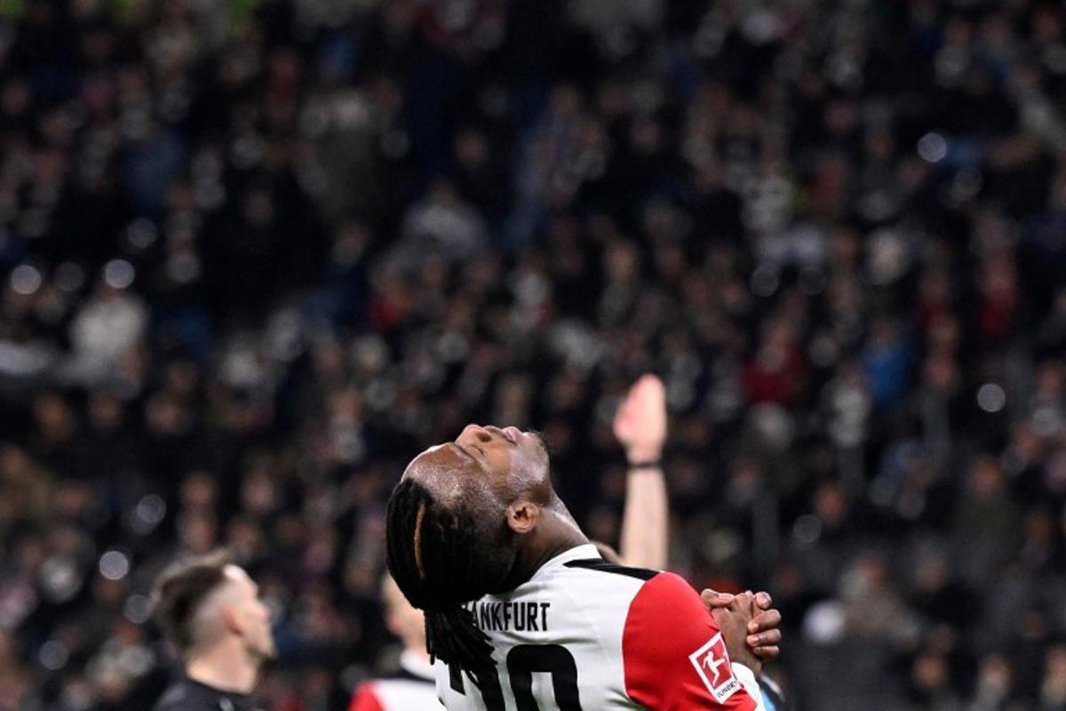 Michy Batshuayi reacts during the German first division Bundesliga football match between Eintracht Frankfurt and Bayer 04 Leverkusen in Frankfurt on March 1, 2025. Kirill KUDRYAVTSEV / AFP