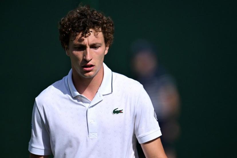 France's Ugo Humbert reacts whilst playing against Belgium's Zizou Bergs during their men's singles first round tennis match on the second day of the 2026 Wimbledon Championships at The All England Lawn Tennis and Croquet Club in Wimbledon, southwest London, on June 30, 2026. Kirill KUDRYAVTSEV / AFP