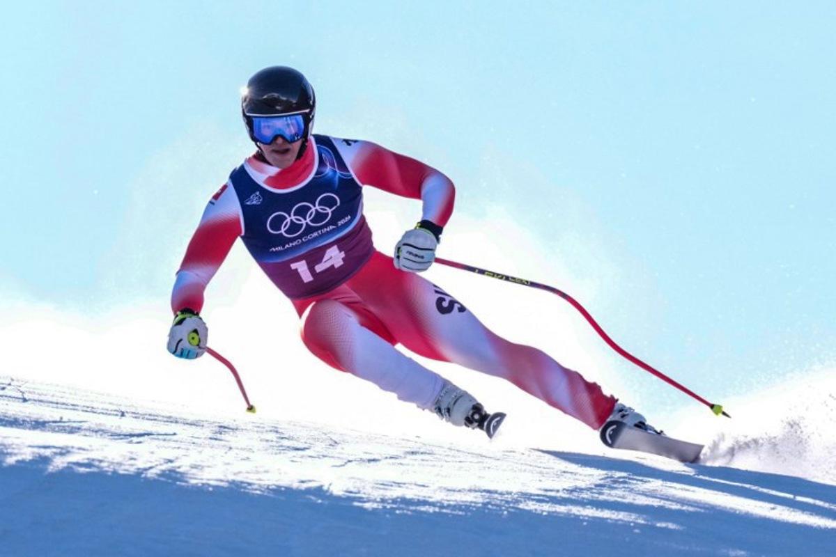 Switzerland's Franjo von Allmen competes in the downhill run of the men's team combined alpine skiing event during the Milano Cortina 2026 Winter Olympic Games at the Stelvio Ski Centre in Bormio (Valtellina) on February 9, 2026. Dimitar DILKOFF / AFP