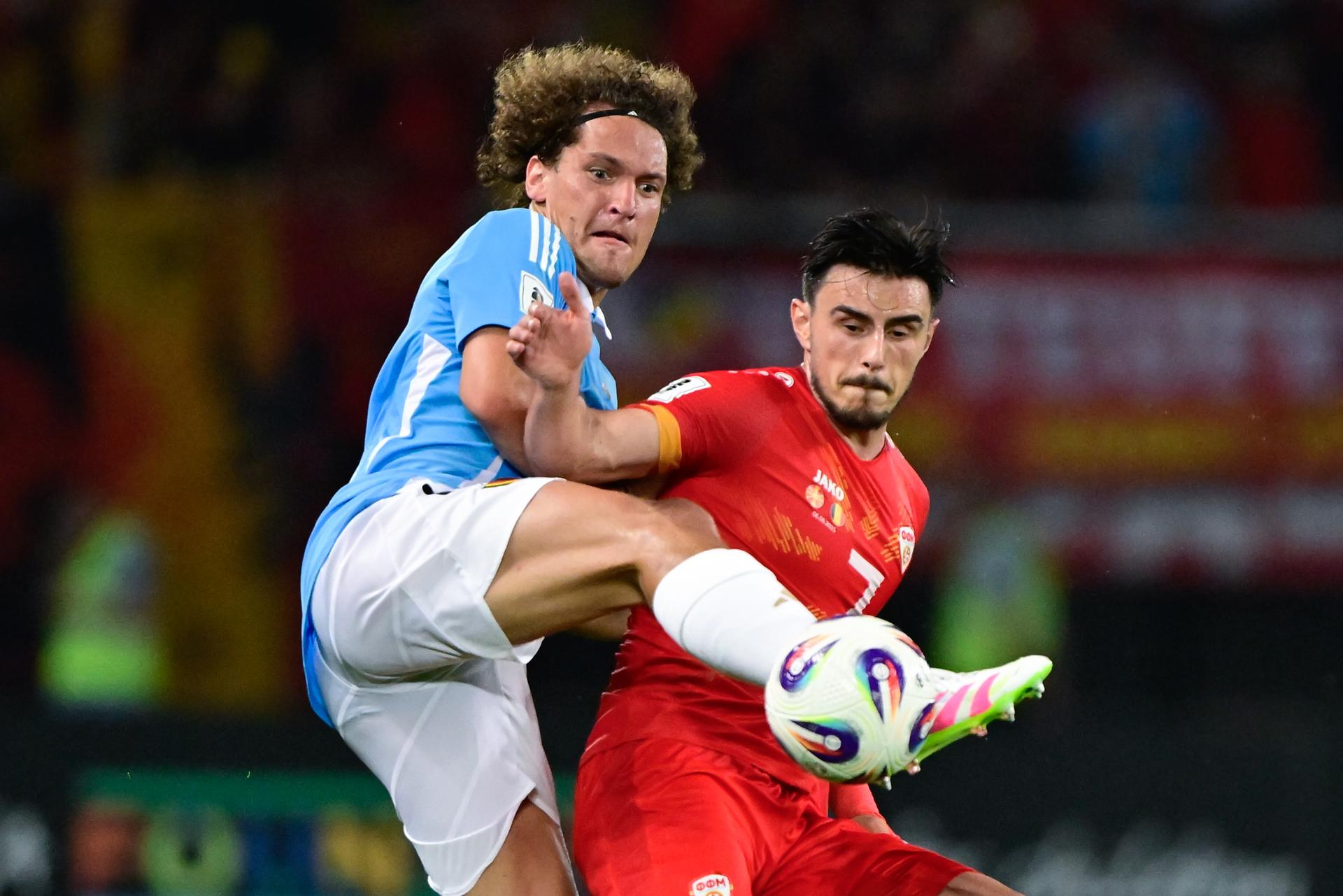 Belgium's Wout Faes and North Macedonia's Eljif Elmas fight for the ball during a soccer game between North Macedonia and Belgian national team Red Devils, Friday 06 June 2025 in Skopje, the first (out of 8) qualification games for the World Cup 2026. BELGA PHOTO DIRK WAEM