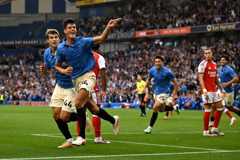 Brighton's Spanish midfielder #14 Chema Andrés celebrates scoring the team's third goal during the English Premier League football match between Brighton and Hove Albion and Arsenal at the American Express Community Stadium in Brighton, southern England on September 19, 2026. Glyn KIRK / AFP