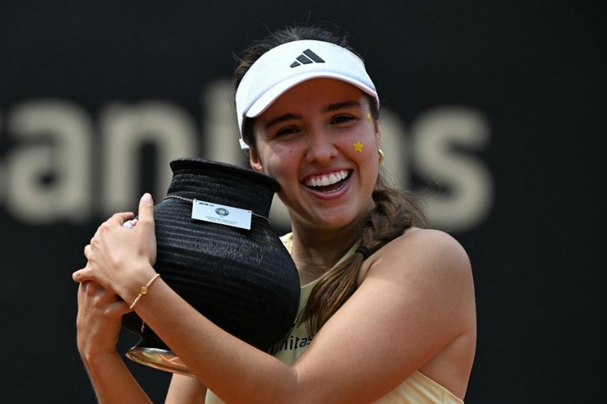 Colombia's Camila Osorio holds the trophy after defeating Poland's Katarzyna Kawa during the WTA Bogota 2025 women's singles final match in Bogota on April 6, 2025. Luis ACOSTA / AFP