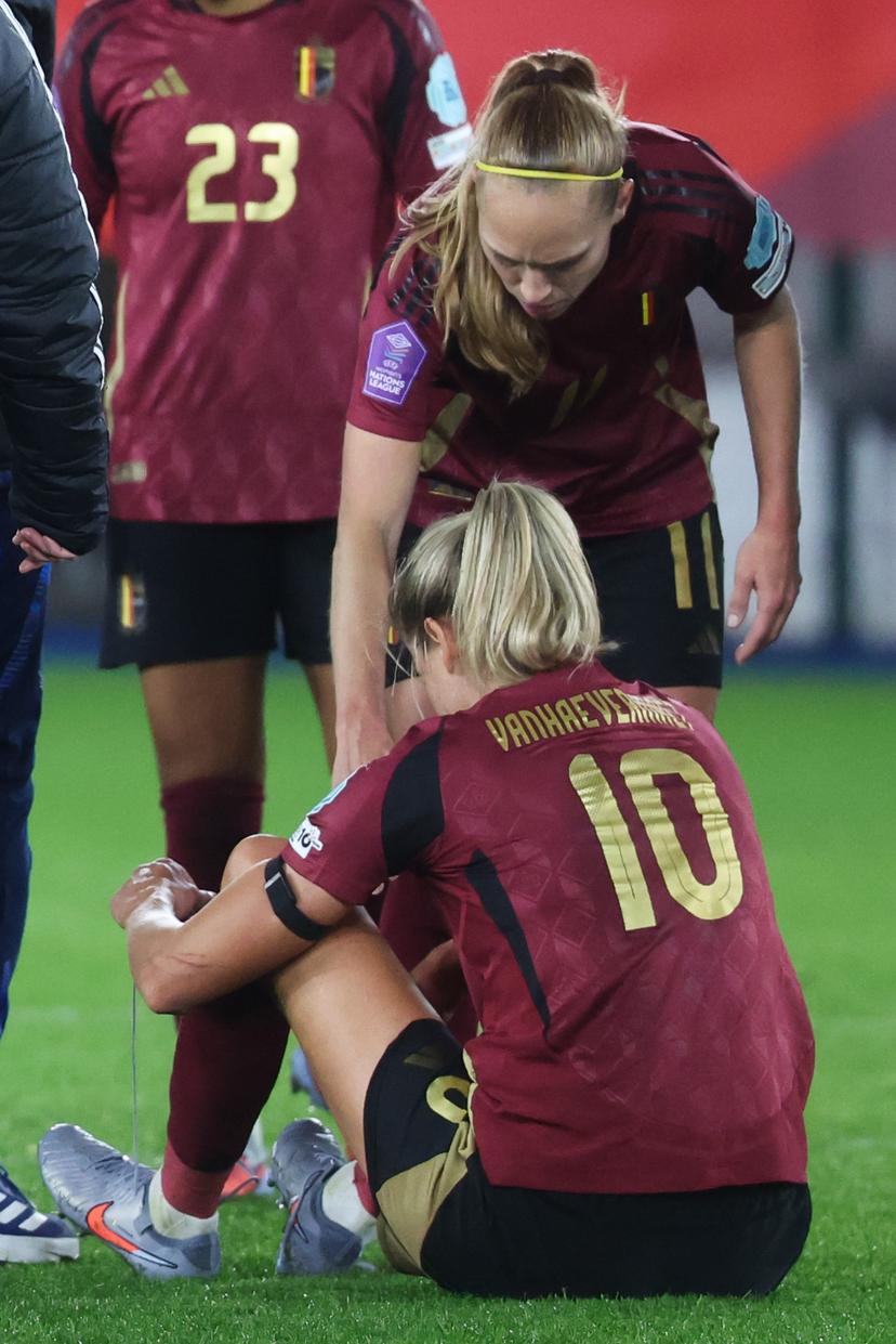 Belgium's Justine Vanhaevermaet and Belgium's Janice Cayman look dejected after a soccer game between Belgium's national women's team the Red Flames and Ireland, the return leg in the Nations League Promotion/relegation play-off, on Tuesday 28 October 2025 in Leuven. Flames lost the first leg 4-2. BELGA PHOTO VIRGINIE LEFOUR