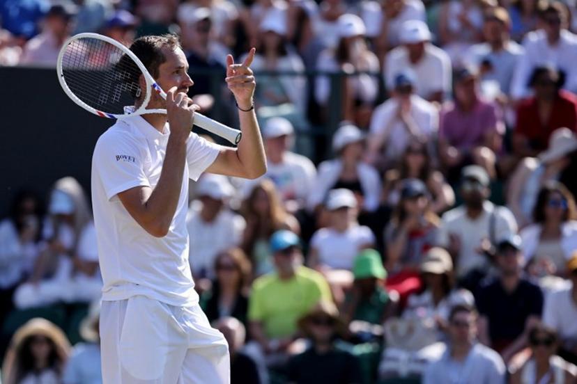 Russia's Daniil Medvedev reacts against Germany's Jan-Lennard Struff during their men's singles third round tennis match on the fifth day of the 2026 Wimbledon Championships at The All England Lawn Tennis and Croquet Club in Wimbledon, southwest London, on July 3, 2026. Henry NICHOLLS / AFP