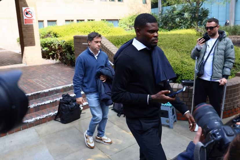 Former Arsenal midfielder Thomas Partey departs following his hearing at the Southwark Crown Court in London on April 13, 2026. Partey, who now plays for Spanish club Villarreal, was charged in February with two further counts of rape. Toby Shepheard / AFP