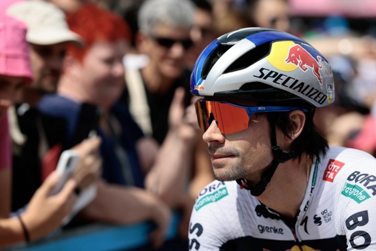 Red Bull-Bora-Hansgrohe's Slovenian rider Primoz Roglic awaits the start of the 15th stage of the 108th Giro d'Italia cycling race of 219kms from Fiume Veneto to Asiago on May 25, 2025. Luca Bettini / AFP