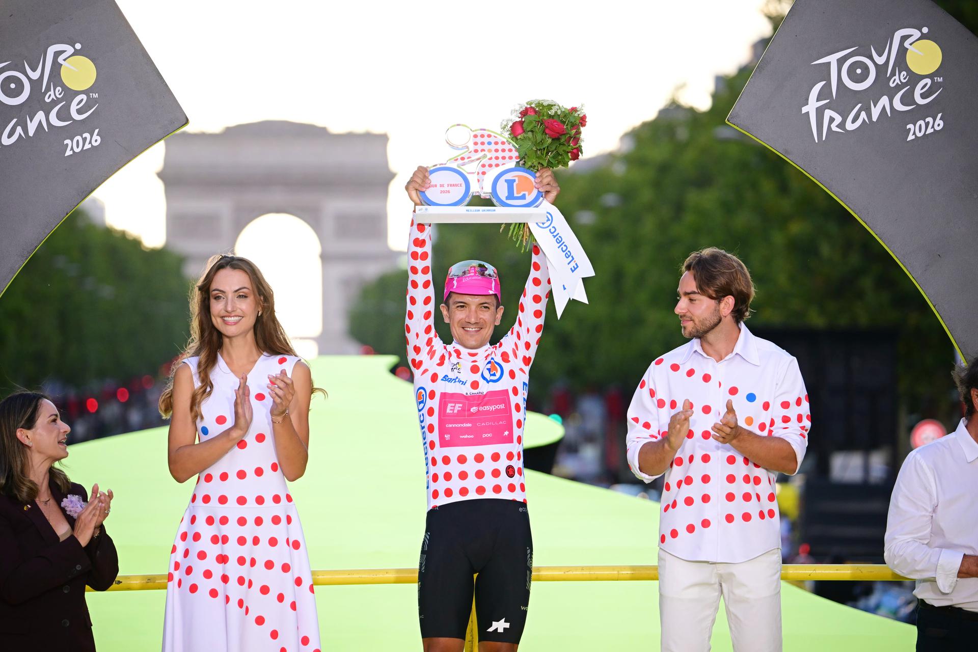 Ecuadorian Richard Carapaz of EF Education-EasyPost and is pictured on the podium after stage 21 of the 2026 Tour de France cycling race, a stage of 130km from Thoiry to Paris Champs-Elysees , on Sunday 26 July 2026. The 113th edition of the Tour de France starts on Saturday 4 July in Barcelona, Spain, and will finish in Paris, France on the 26th of July. BELGA PHOTO POOL BERNARD PAPON