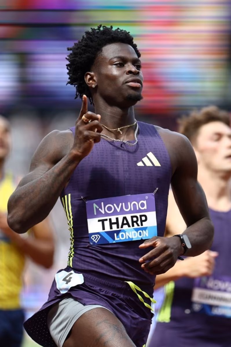 USA's Ja'Kobe Tharp celebrates after crossing the finish line to win the men's 110m hurdles event during the IAAF Diamond League athletics competition at the London stadium in London on July 18, 2026. Henry NICHOLLS / AFP