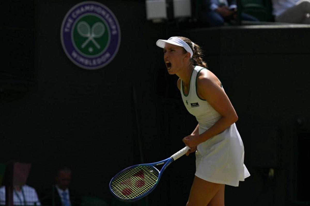 Belgium's Elise Mertens celebrates against Kazakhstan's Elena Rybakina during their women's singles third round tennis match on the sixth day of the 2026 Wimbledon Championships at The All England Lawn Tennis and Croquet Club in Wimbledon, southwest London, on July 4, 2026. Glyn KIRK / AFP
