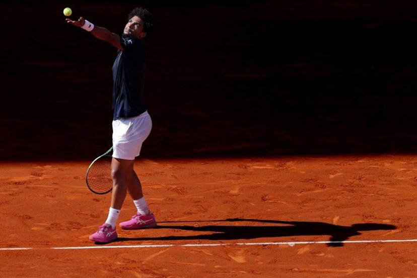 France's Arthur Fils serves a ball to Italy's Jannik Sinner during their 2026 ATP Tour Madrid Open tennis tournament semi-final singles match at the Caja Magica in Madrid, on May 1, 2026. Thomas COEX / AFP
