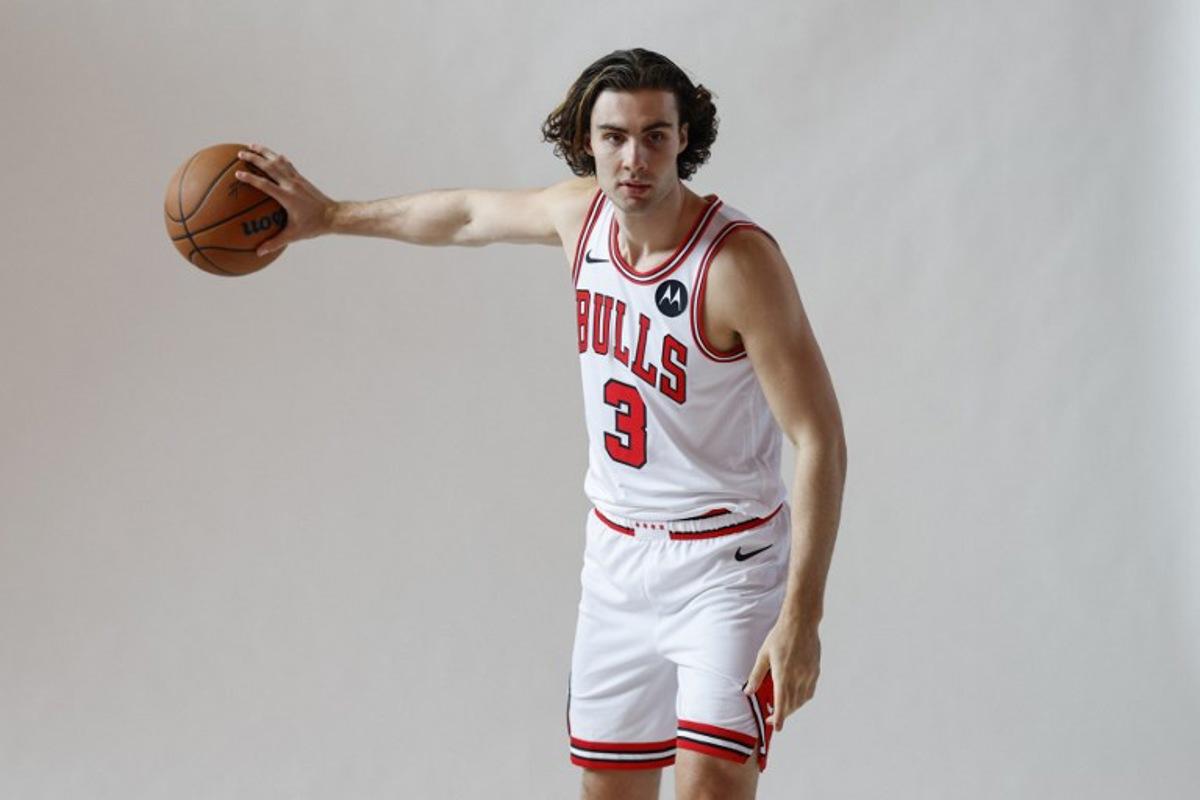 Australian guard Josh Giddey poses for photos during the Chicago Bulls media day at the United Center in Chicago, Illinois on September 29, 2025. KAMIL KRZACZYNSKI / AFP