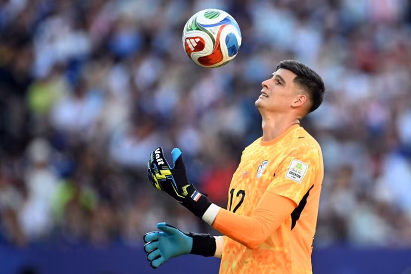 Paraguay's goalkeeper #12 Orlando Gill controls the ball during the 2026 World Cup round of 16 football match between Paraguay and France at the Philadelphia Stadium in Philadelphia on July 4, 2026. MAURO PIMENTEL / AFP