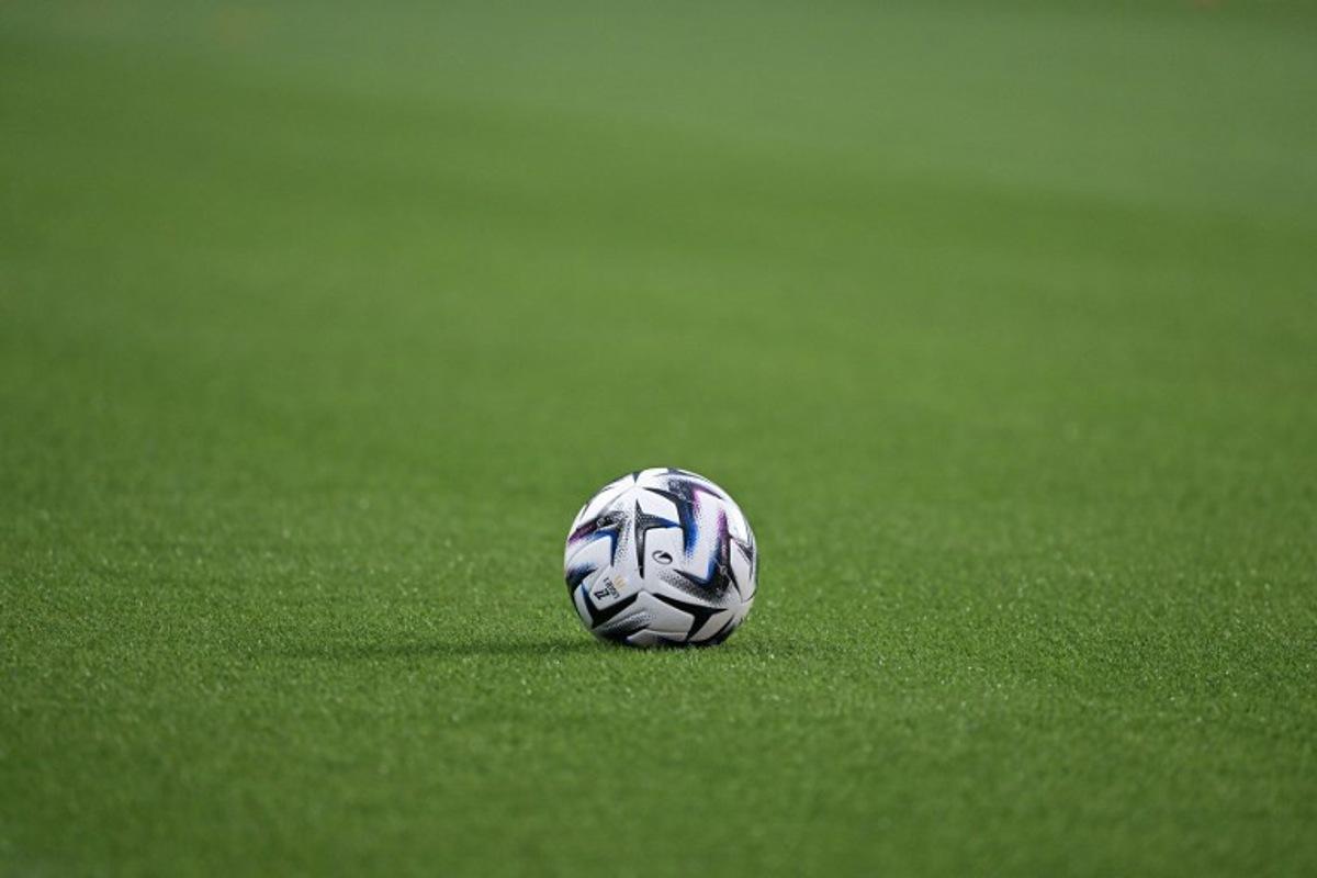 This photograph shows the the Ligue 1 ball on the pitch prior to the start of the French L1 football match between Stade Rennais FC and Olympique Lyonnais (OL) at the Roazhon Park stadium in Rennes, western France, on September 14, 2025. DAMIEN MEYER / AFP