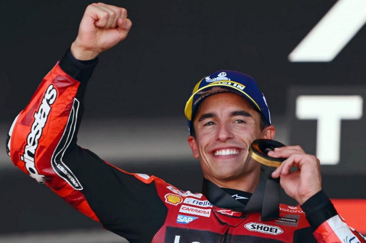 Team Ducati Lenovo Team's Marc Marquez celebrates winning the sprint race of the MotoGP Aragon Grand Prix at the Motorland circuit in Alcaniz, northeastern Spain, on August 29, 2026. JOSE JORDAN / AFP