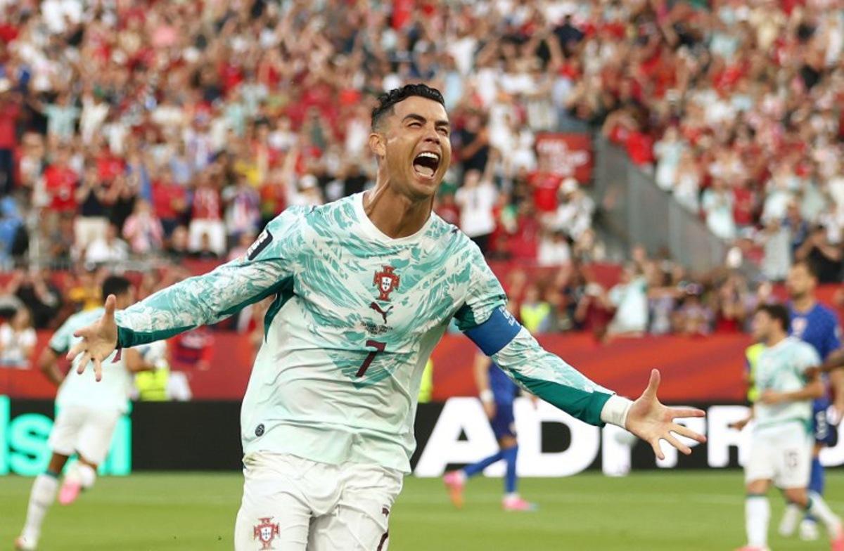 Portugal's forward #07 Cristiano Ronaldo celebrates after scoring his team's first goal from the penalty spot during the 2026 World Cup round of 32 football match between Portugal and Croatia at the Toronto Stadium in Toronto on July 2, 2026. Cole Burston / AFP