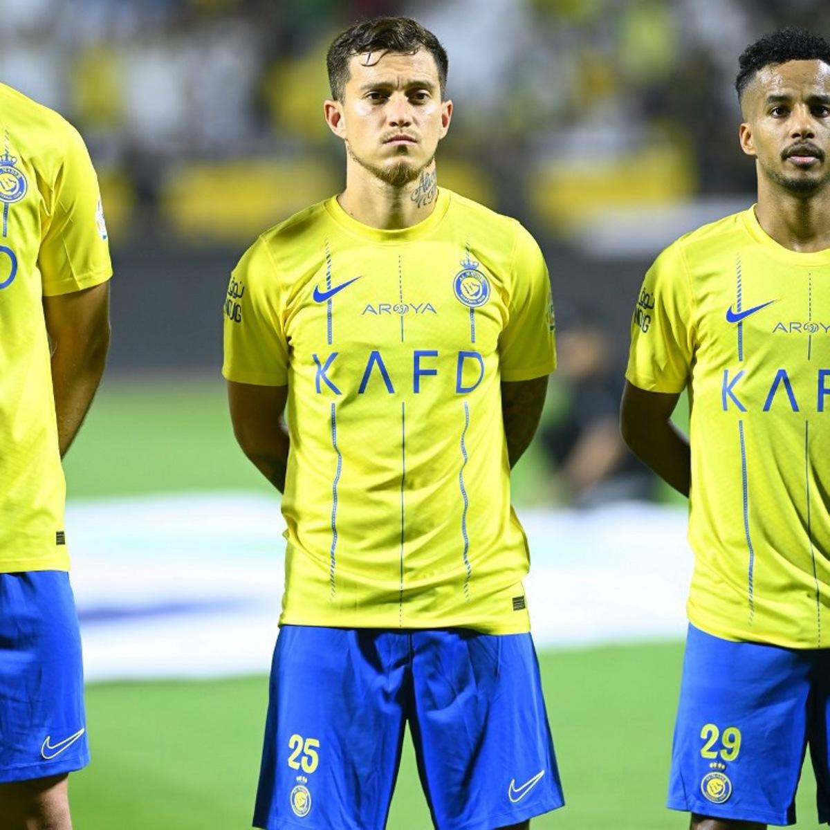 Nassr's Portuguese forward #25 Otavio and Nassr's Saudi midfielder #29 Abdulrahman Ghareebthe stand before the Saudi Pro League football match between Al-Nassr and Al-Fateh at the Prince Abdullah Bin Jalawi Stadium in al-Hasa, on August 25, 2023. Ali Al-HAJI / AFP