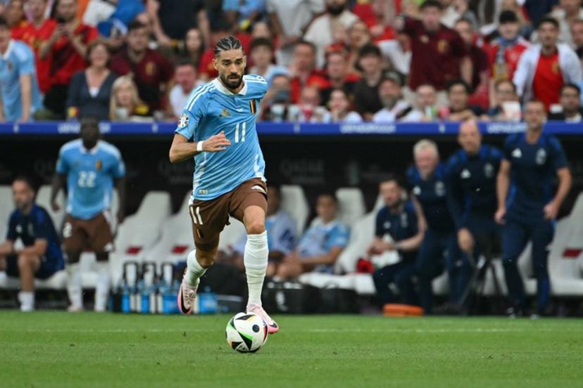 Belgium's forward #11 Yannick Carrasco runs with the ball during the UEFA Euro 2024 Group E football match between Ukraine and Belgium at the Stuttgart Arena in Stuttgart on June 26, 2024. MIGUEL MEDINA / AFP