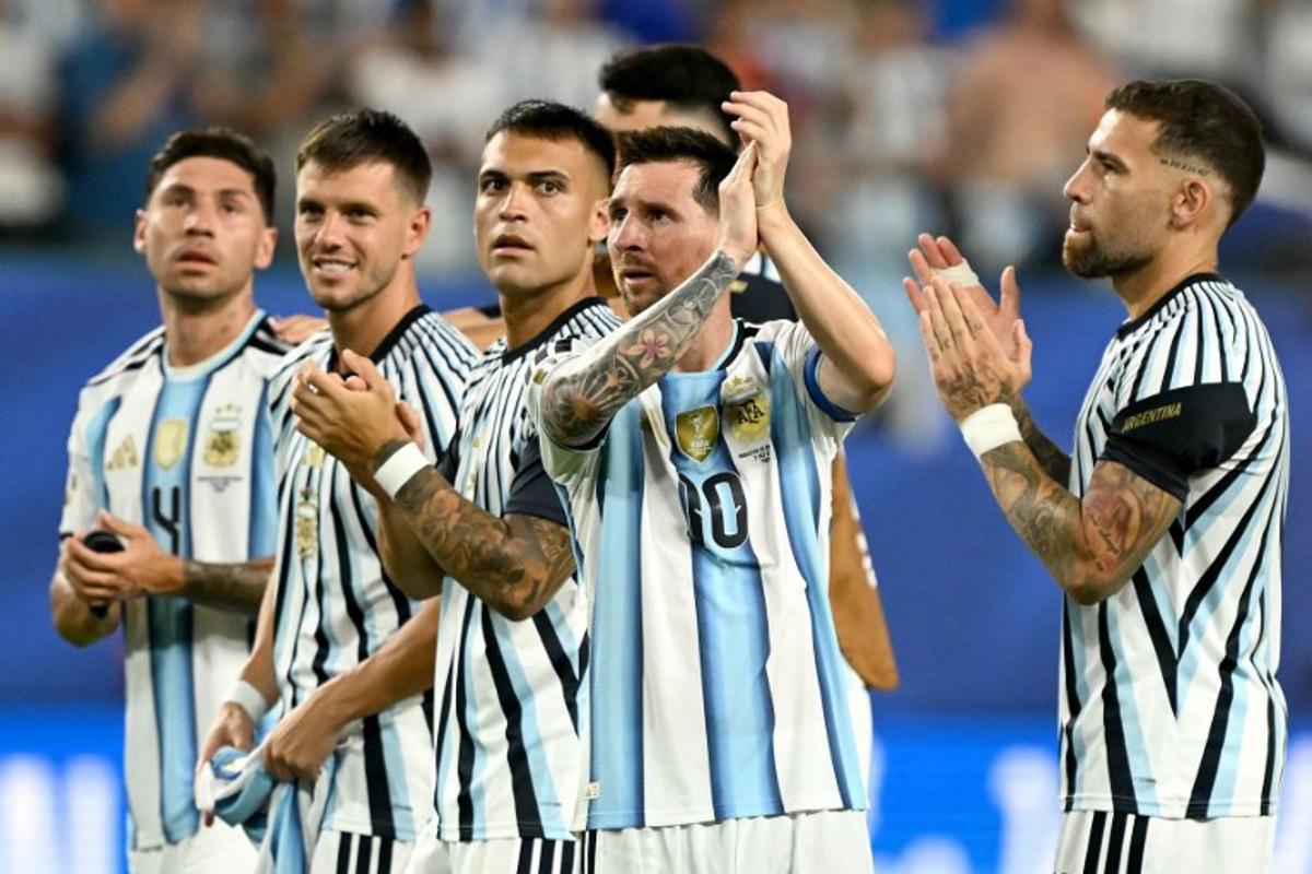 Argentina's forward #10 Lionel Messi celebrates next to teammates after winning the 2026 World Cup round of 32 football match between Argentina and Cape Verde at the Miami Stadium in Miami Gardens on July 3, 2026. CHANDAN KHANNA / AFP