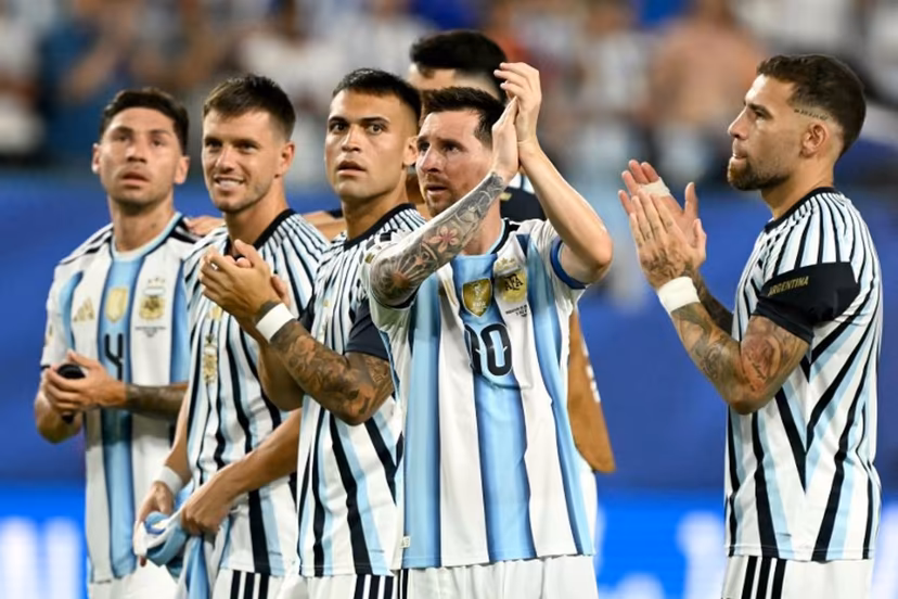 Argentina's forward #10 Lionel Messi celebrates next to teammates after winning the 2026 World Cup round of 32 football match between Argentina and Cape Verde at the Miami Stadium in Miami Gardens on July 3, 2026. CHANDAN KHANNA / AFP