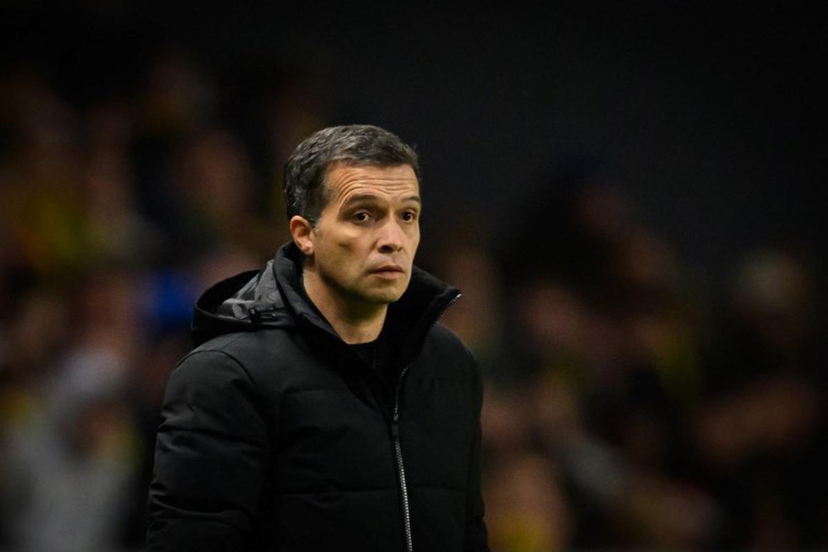 Nantes' Portuguese head coach Luis Castro looks on during the French L1 football match between FC Nantes and RC Lens at the Stade de la Beaujoire-Louis Fonteneau in Nantes, western France, on December 6, 2025. Loic VENANCE / AFP