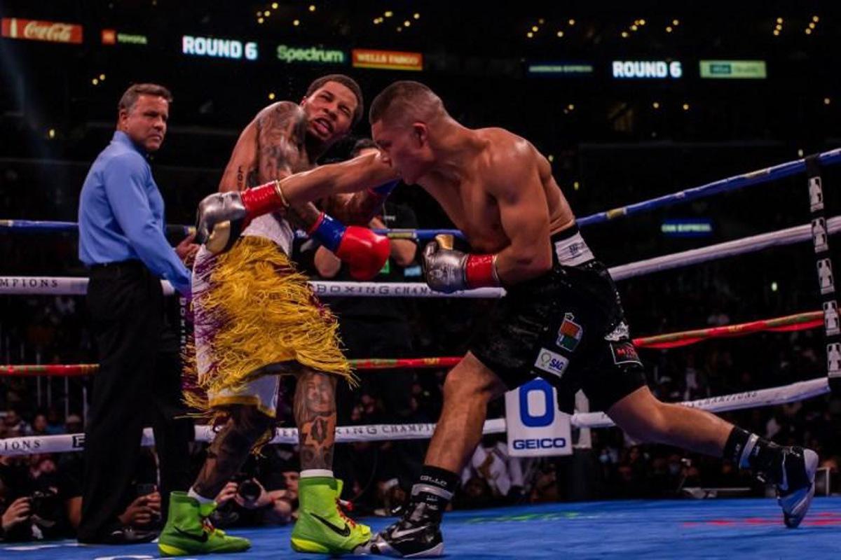 US boxer Gervonta Davis (L) fights Mexican boxer Isaac Cruz during their WBA Lightweight Championship bout at the Staples center in Los Angeles, California on December 5, 2021. Apu GOMES / AFP