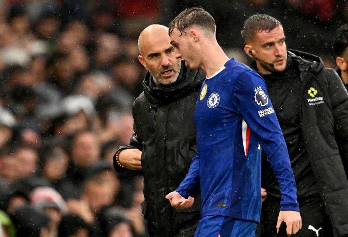 Chelsea's English midfielder #10 Cole Palmer leaves the pitch after being substituted off during the English Premier League football match between Manchester United and Chelsea at Old Trafford in Manchester, north west England, on September 20, 2025. Oli SCARFF / AFP