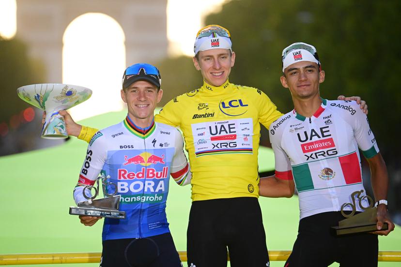 Belgian Remco Evenepoel of Red Bull-BORA-hansgrohe, Slovenian Tadej Pogacar of UAE Team Emirates XRG and Mexican Isaac Del Toro of UAE Team Emirates XRG pictured on the podium after stage 21 of the 2026 Tour de France cycling race, a stage of 130km from Thoiry to Paris Champs-Elysees , on Sunday 26 July 2026. The 113th edition of the Tour de France starts on Saturday 4 July in Barcelona, Spain, and will finish in Paris, France on the 26th of July. BELGA PHOTO POOL BERNARD PAPON
