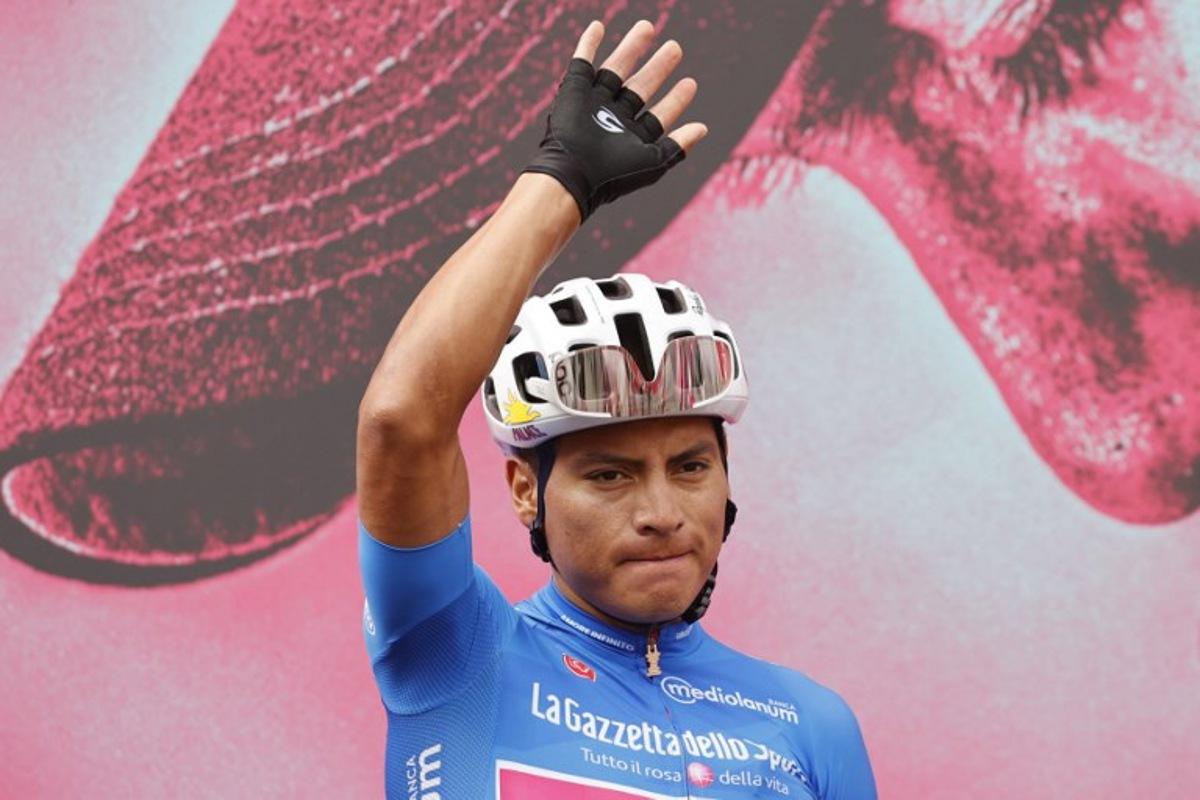 Team Education First rider Ecuador's Jonathan Caicedo waves from the presentation podium prior to the start of the 4th stage of the Giro d'Italia 2020 cycling race, a 140-kilometer route between Catania and Villafranca Tirrena, Sicily, on October 6, 2020. Luca Bettini / AFP