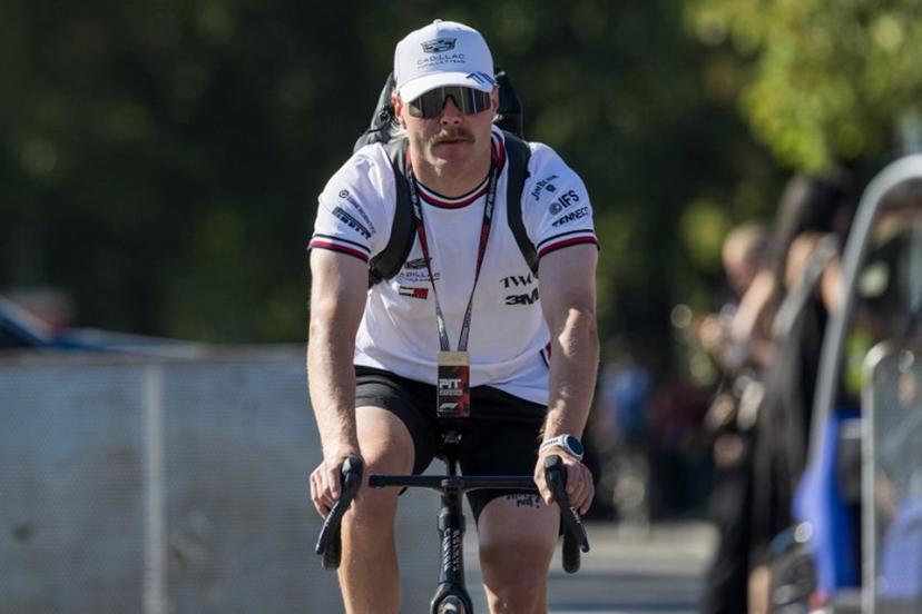 Cadillac's Finnish driver Valtteri Bottas arrives in the paddock with a bicycle ahead of the Italian Formula One Grand Prix at the Autodromo Nazionale Monza circuit in Monza, northern Italy on September 4, 2026. Andrej ISAKOVIC / AFP