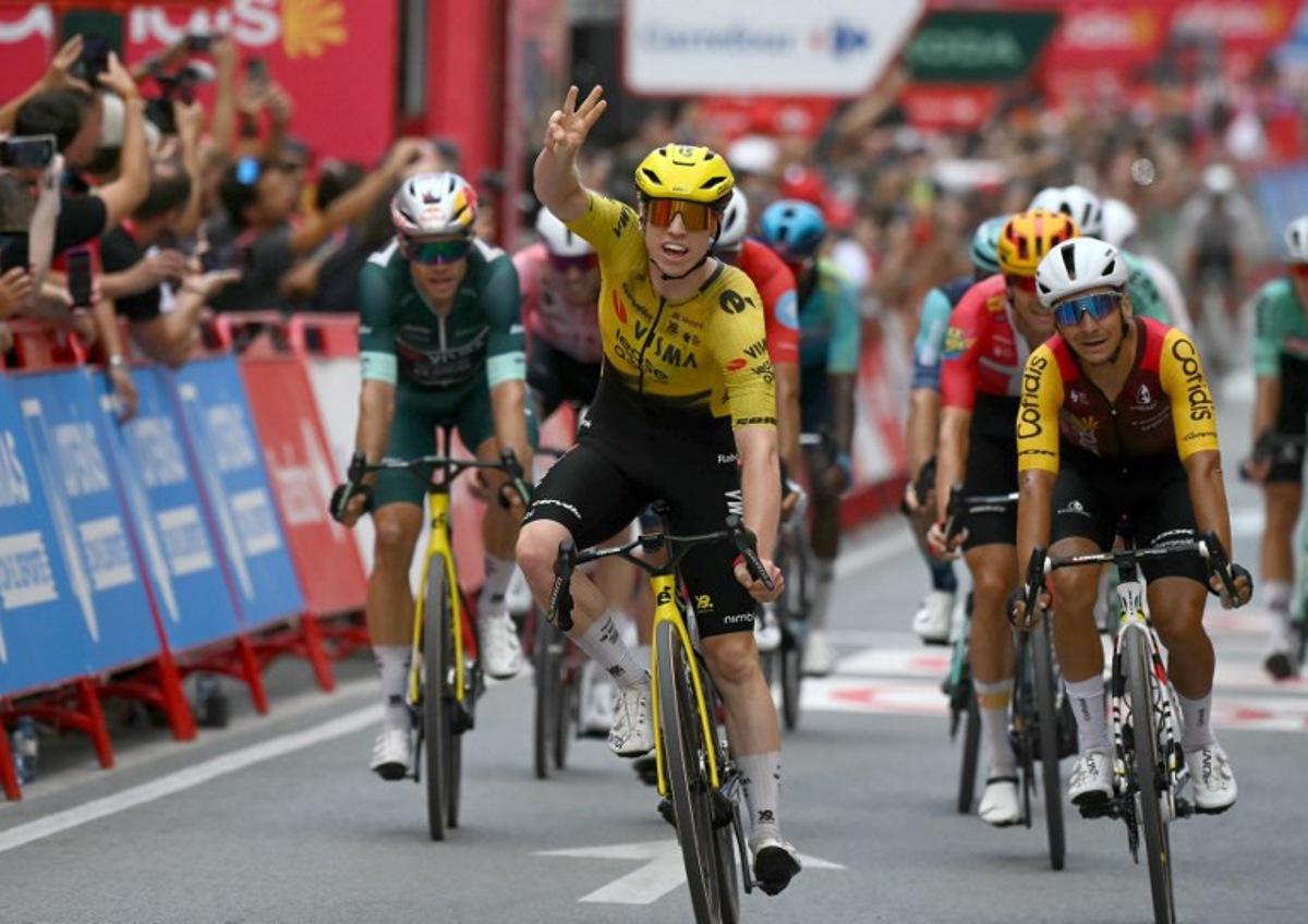 Team Visma-Lease a bike's British rider Matthew Brennan (C) followed by Team Cofidis' French rider Bryan Coquard (R) celebrates winning the 11th stage of the Vuelta a Espana 2026 cycling tour, a 151,3 km race between Carthagena and Lorca, on September 2, 2026. JOSE JORDAN / AFP