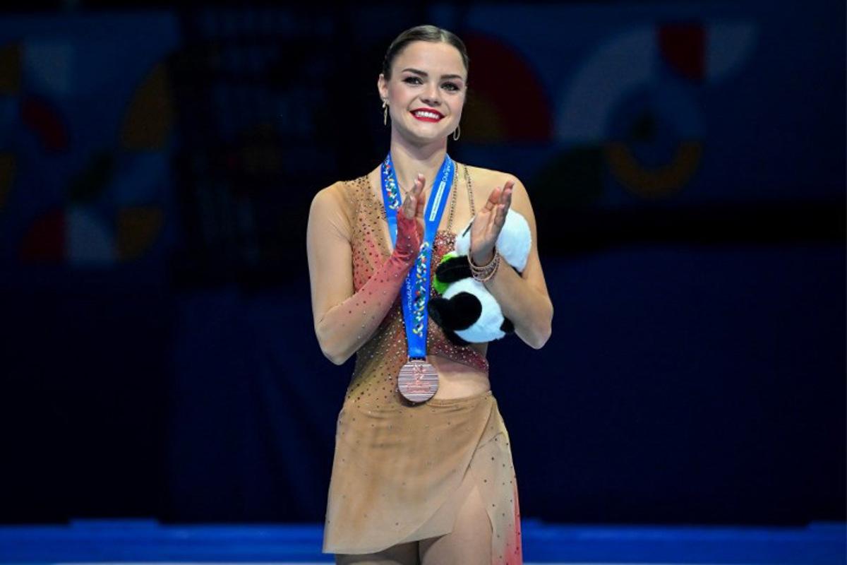 Bronze medallist Belgium's Loena Hendrickx attends an awards ceremony for women's free skating during the ISU Skate to Milano Figure Skating Qualifier 2025 in Beijing on September 20, 2025. ADEK BERRY / AFP