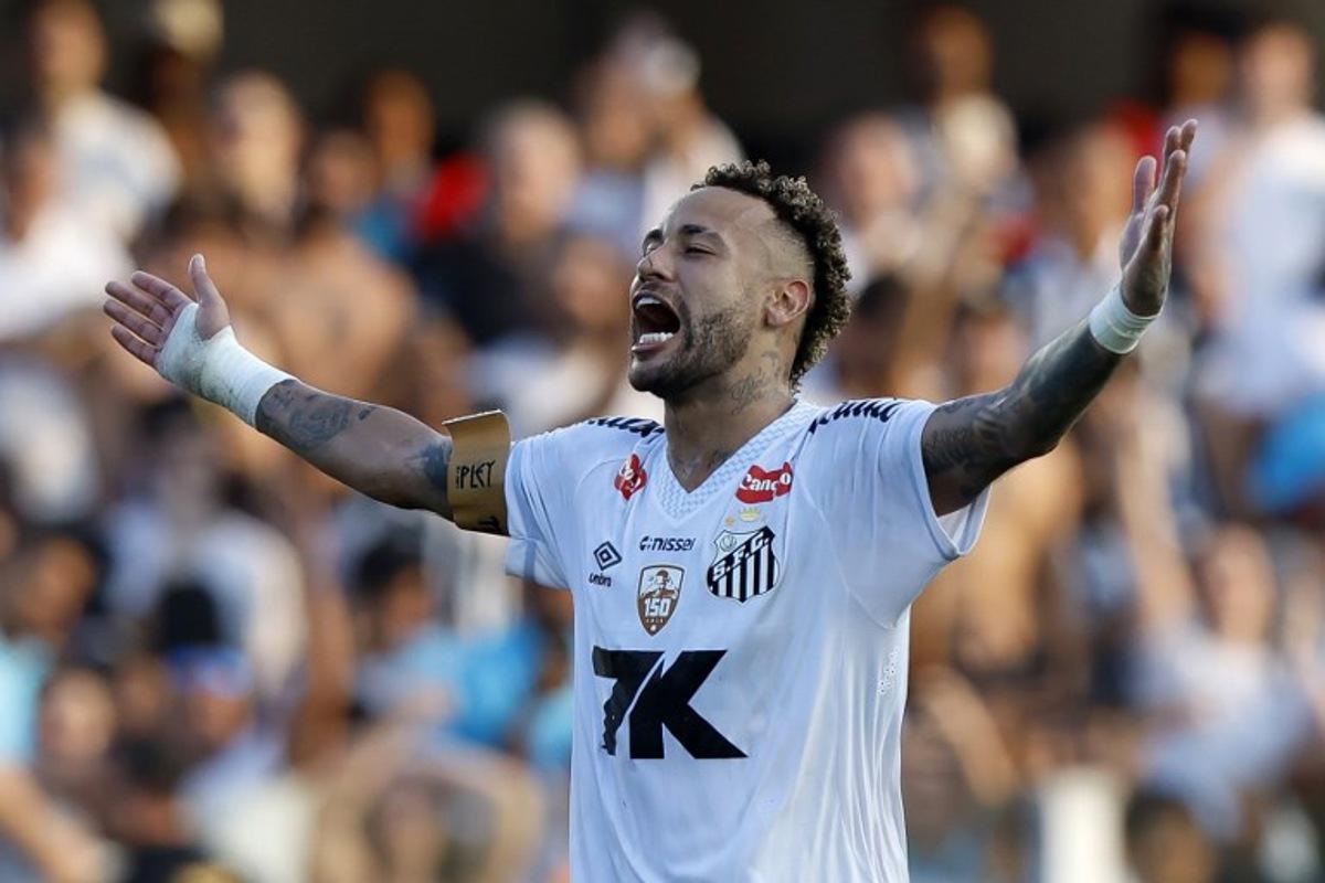 Santos' forward #10 Neymar celebrates at the end of the Brasileirao Serie A football match between Santos and Cruzeiro at the Urbano Caldeira Stadium in Santos, Sao Paulo state, Brazil on December 7, 2025. Miguel Schincariol / AFP