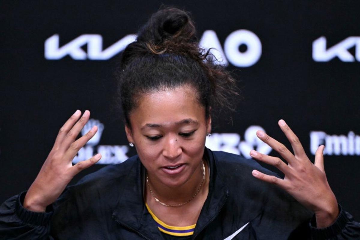 Japan's Naomi Osaka speaks during a press conference after winning her women's singles match against Romania's Sorana Cirstea on day five of the Australian Open tennis tournament in Melbourne on January 22, 2026. WILLIAM WEST / AFP
