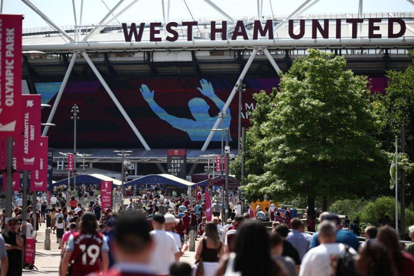 West Ham fans arrive for the English Premier League football match between West Ham United and Leeds United at the London Stadium, in east London on May 24, 2026. Henry Nicholls / AFP