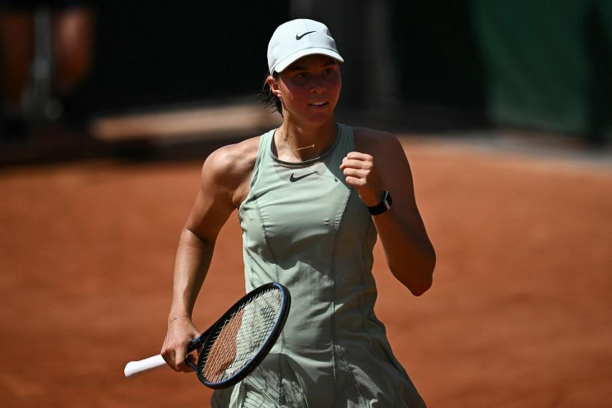Austria's Lilli Tagger reacts to a point China's Wang Xinuy during their women's singles match on day 1 of the French Open tennis tournament at the Roland-Garros Complex in Paris on May 24, 2026. JULIEN DE ROSA / AFP
