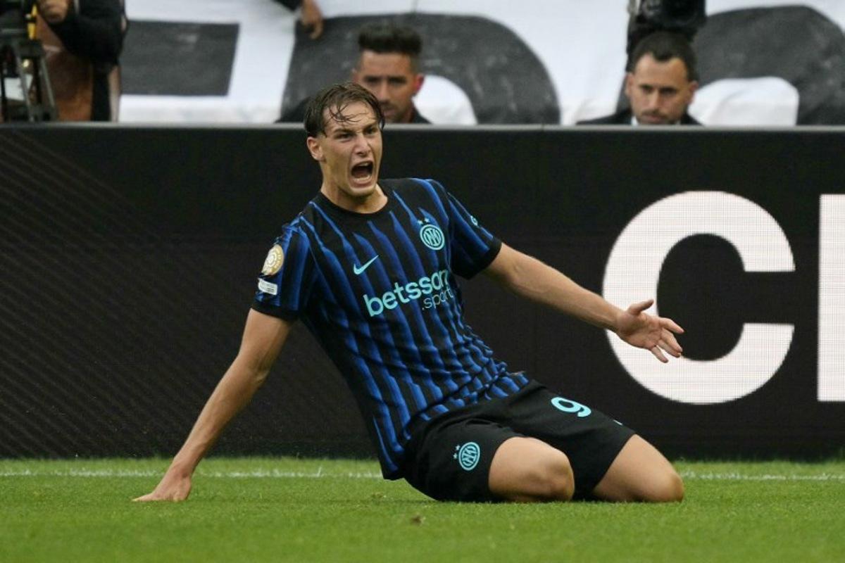 Inter Milan's Italian forward #94 Francesco Esposito celebrates scoring his team's first goal during the FIFA Club World Cup 2025 Group E football match between Italy's Inter Milan and Argentina's River Plate at the Lumen Field stadium in Seattle on June 23, 2025. JUAN MABROMATA / AFP