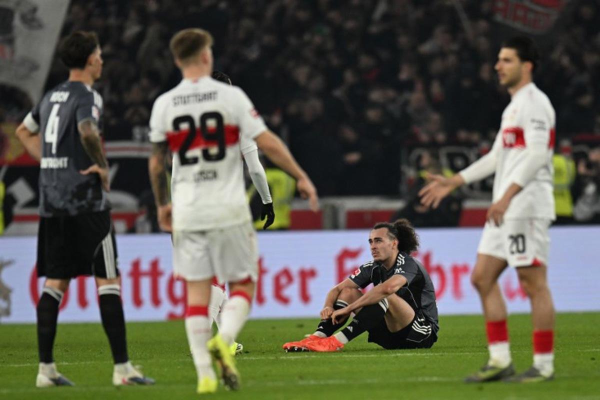 Frankfurt's Belgian defender #03 Arthur Theate reacts after the German first division Bundesliga football match between VfB Stuttgart and Eintracht Frankfurt in Stuttgart, southern Germany, on January 13, 2026. THOMAS KIENZLE / AFP