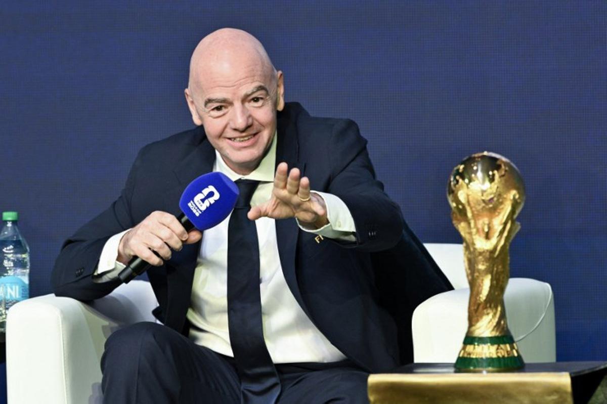 FIFA President Gianni Infantino speaks during the FIFA World Cup 2026 official match schedule announcement in Washington, DC, on December 6, 2025. Roberto SCHMIDT / AFP