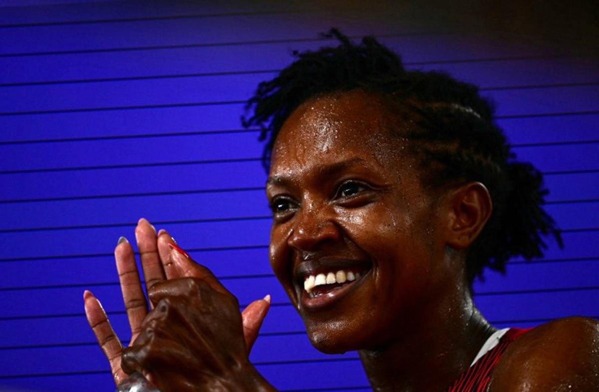 Kenya's Faith Kipyegon reacts after competing in the women's 1500m semi-final during the World Athletics Championships in Tokyo on September 14, 2025. Yuichi YAMAZAKI / AFP