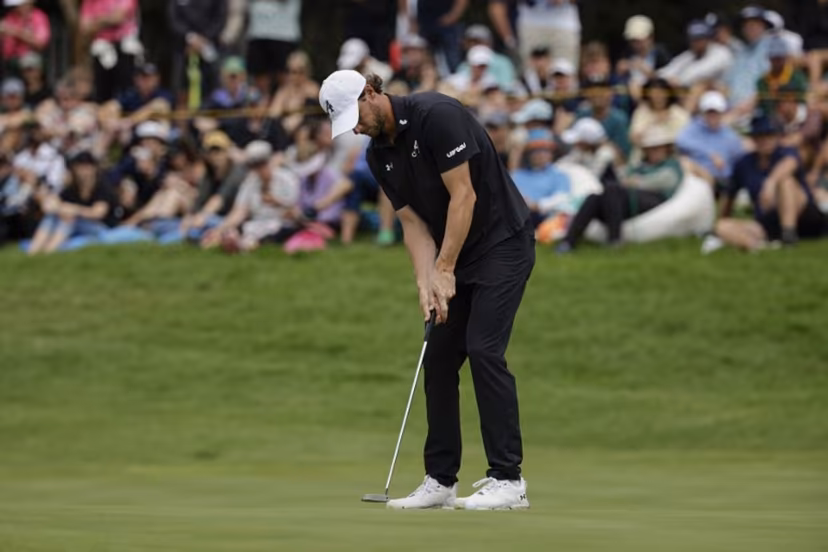4Aces GC's Belgian player Thomas Pieters holes a putt on the 16th green of the fourth day of the LIV Golf South Africa tournament at The Club in Steyn City on March 22, 2026. WIKUS DE WET / AFP