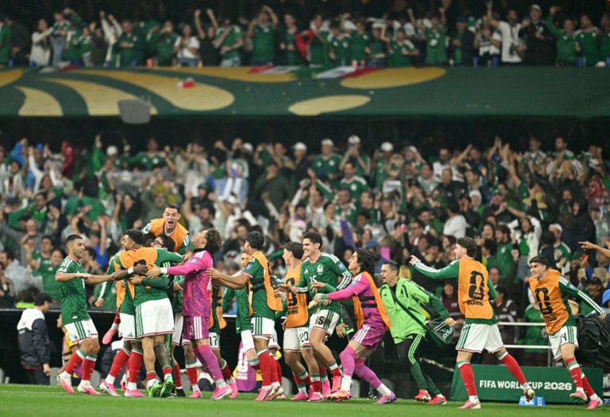 Mexico players celebrate after forward #16 Julian Quinones (unseen) scores his team's first goal during the 2026 World Cup round of 32 football match between Mexico and Ecuador at the Mexico City Stadium in Mexico City on June 30, 2026. Yuri CORTEZ / AFP