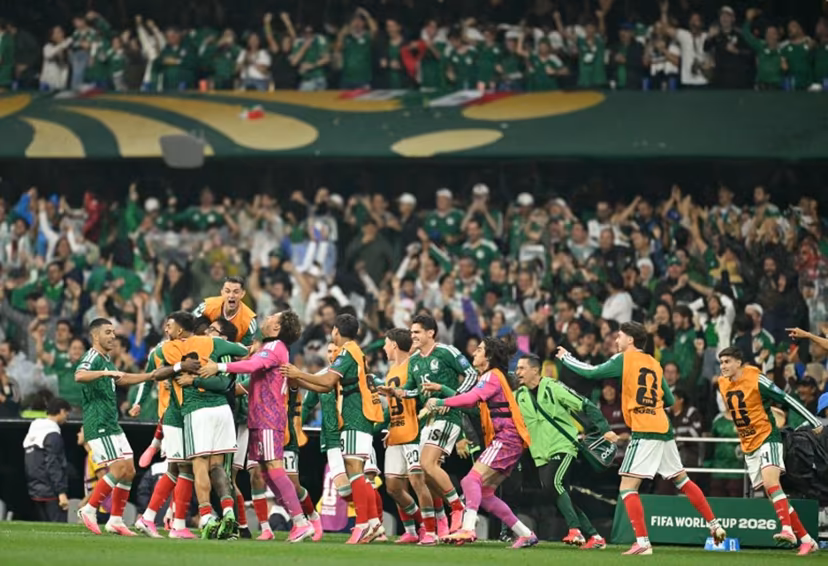 Mexico players celebrate after forward #16 Julian Quinones (unseen) scores his team's first goal during the 2026 World Cup round of 32 football match between Mexico and Ecuador at the Mexico City Stadium in Mexico City on June 30, 2026. Yuri CORTEZ / AFP