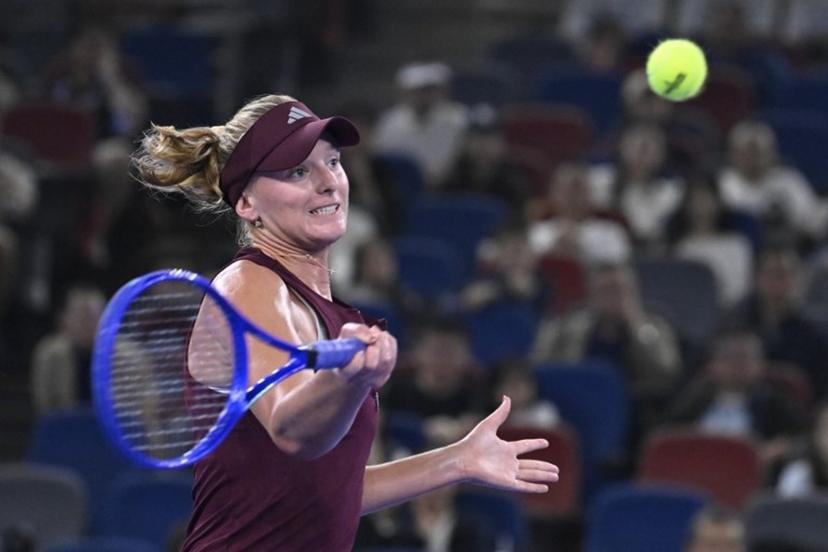 USA's Ashlyn Krueger hits a return to Poland's Iga Swiatek during their women's singles match at the Wuhan Open tennis tournament in Wuhan, China's Hubei province on October 15, 2026. WANG Zhao / AFP