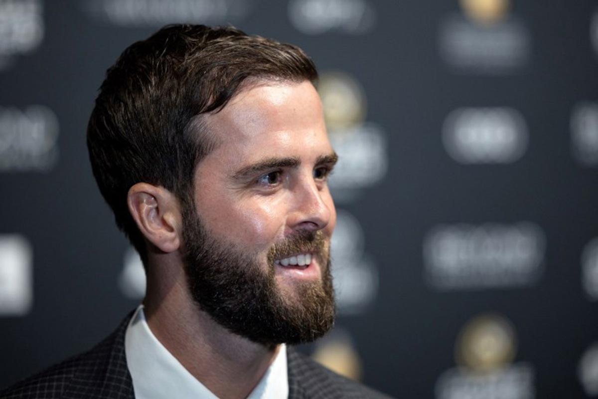 Bosnian midfielder Miralem Pjanic arrives for the Globe Soccer Awards ceremony in Dubai on December 27, 2024. FADEL SENNA / AFP
