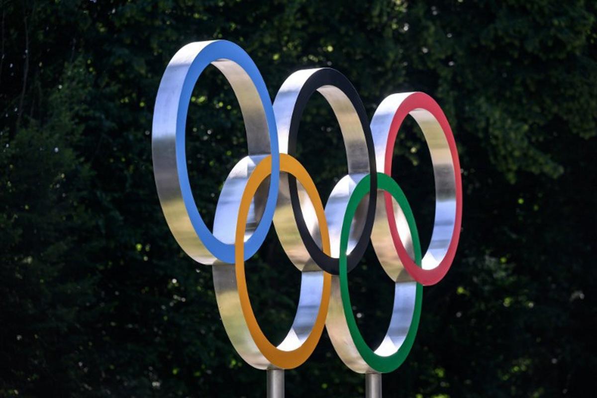 This photograph shows the Olympic rings prior to an IOC executive commission meeting ahead of IOC session, at the Olympic House in Lausanne, on June 22, 2026. Fabrice COFFRINI / AFP
