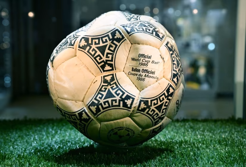 The ball that was used in the 1986 World Cup match between Argentina and England during which Argentina's Diego Maradona scored the "Hand of God" goal is displayed before auction at Heritage Auctions in Beverly Hills, California, on August 7, 2026. The ball that Maradona used to score his infamous "Hand of God" goal is expected to sell for $10 million at a US auction this month. Maradona's goal in the quarter-final match at the Estadio Azteca saw him punch the ball past the England goalkeeper, with the South Americans ultimately winning 2-1. Frederic J. BROWN / AFP