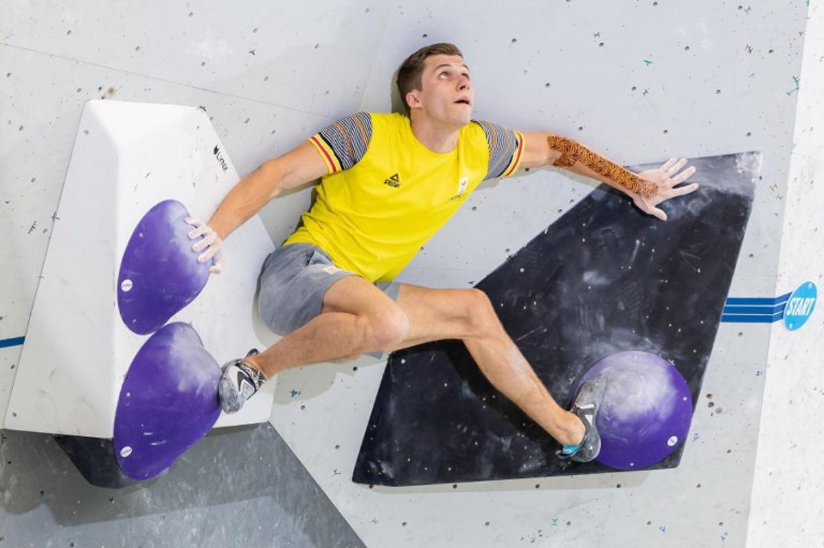 Nicolas Collin of Belgium competes during the men Boulder competition for the IFSC Climbing World Cup in Innsbruck, on June 16, 2023. Johann GRODER / APA / AFP